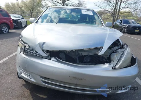 2003 Toyota Camry Le z USA, uszkodzony, nr VIN 4T1BE32K63U655864